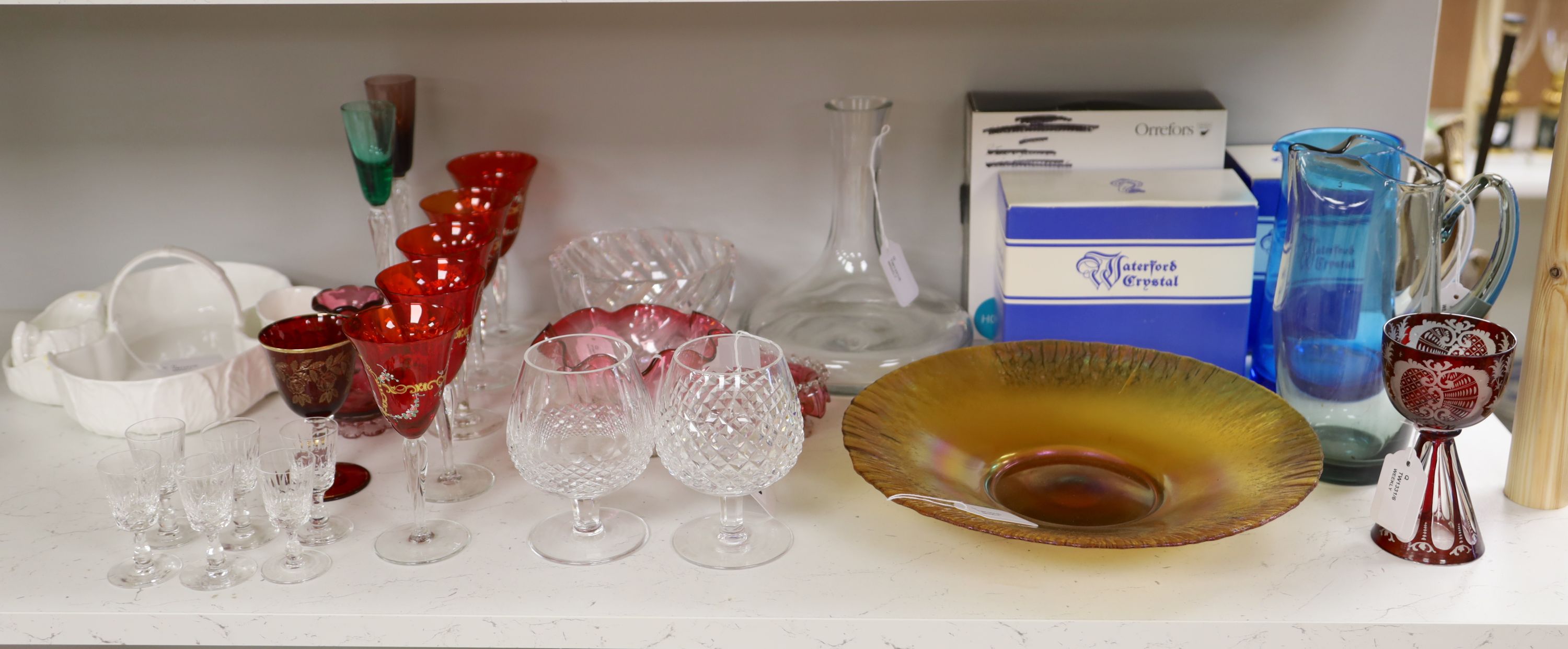 A quantity of glassware, including two Orrefors bowls (one boxed), a large iridescent centrepiece bowl,